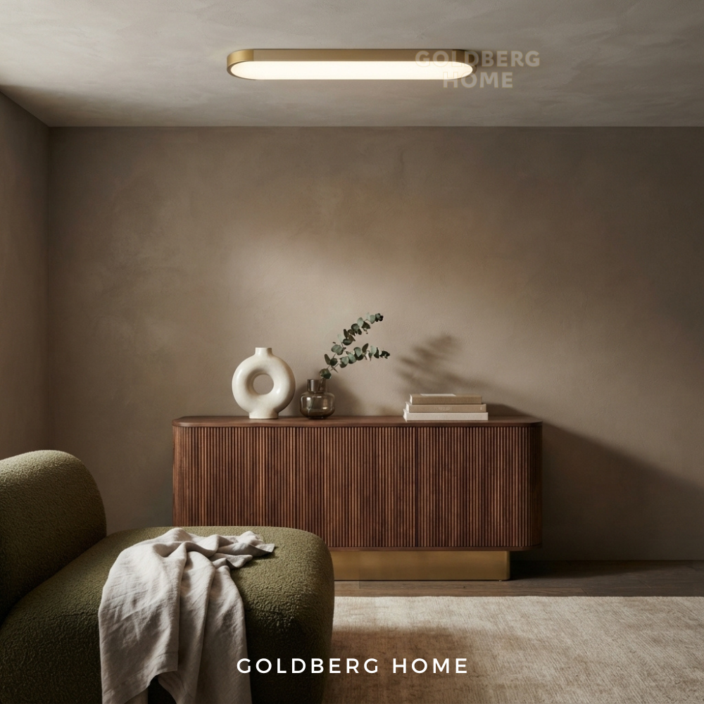 Goldberg Home Bavaria LED ceiling light with half gold and white frame installed in modern minimalist room.