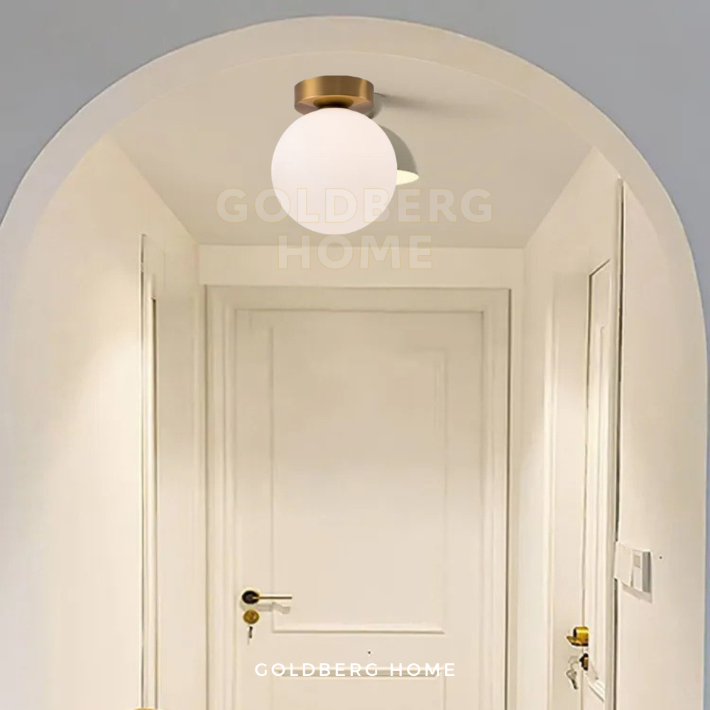 Goldberg Home Boba lamp creating a warm, cozy atmosphere in a minimalist Singaporean flat.