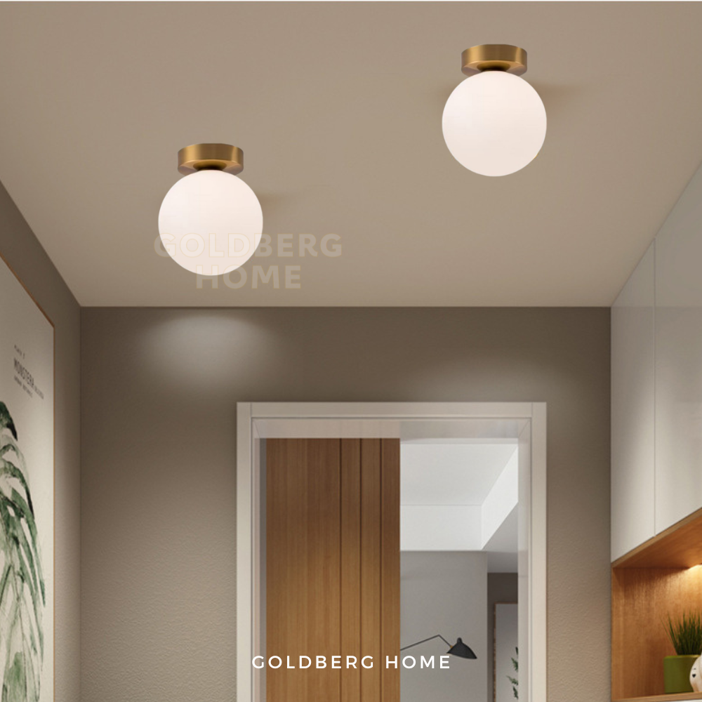 Goldberg Home Boba lamp creating a warm, cozy atmosphere in a minimalist Singaporean flat.
