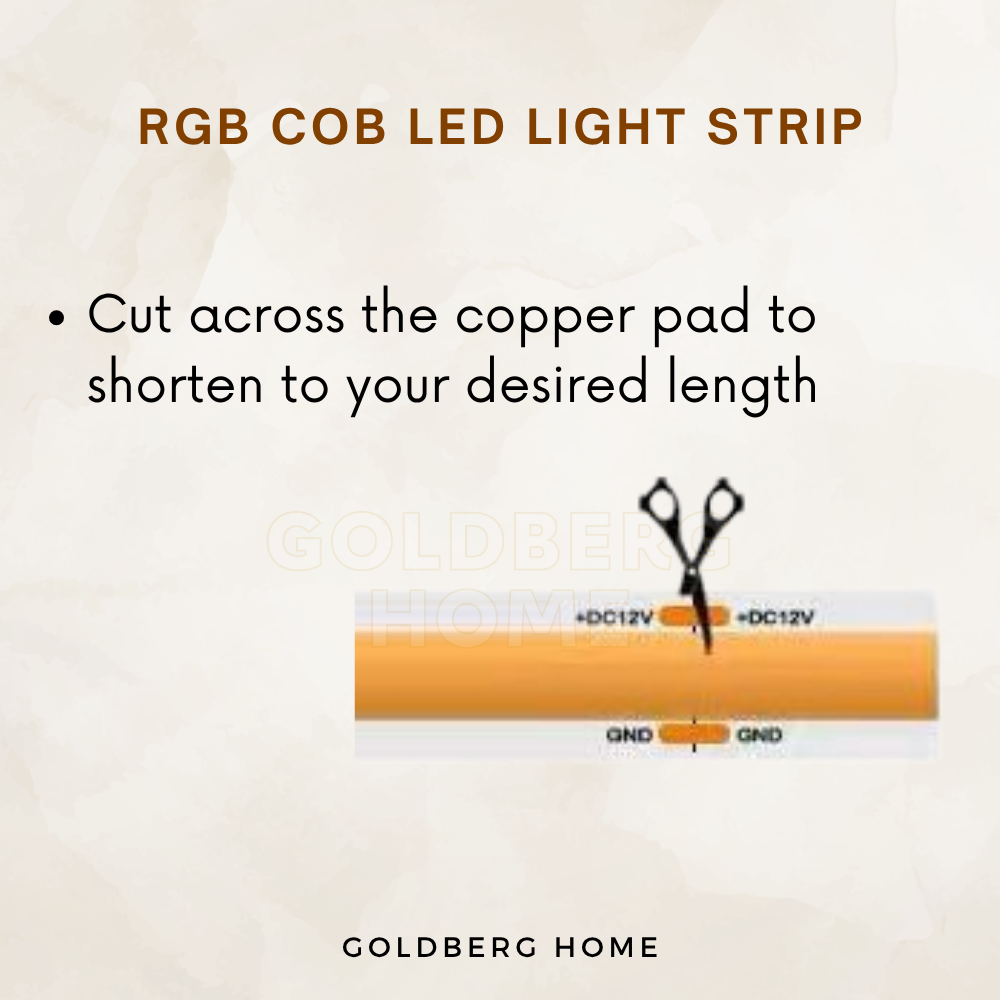 Cuttable 24V RGB COB LED strip showing designated copper cutting points at Goldberg Home.
