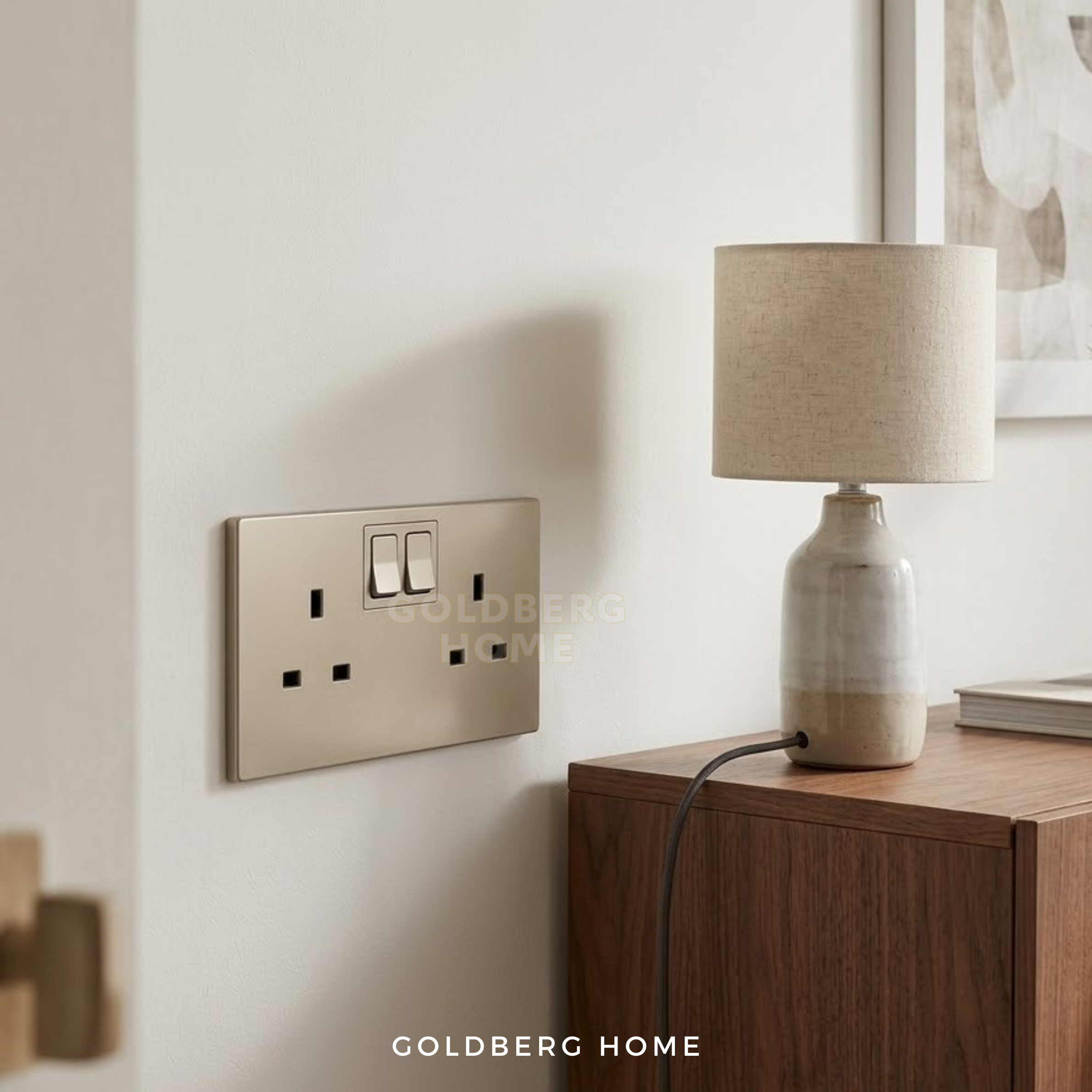 Goldberg Home Galion champagne power socket in a warm minimalist Singapore BTO bedroom.