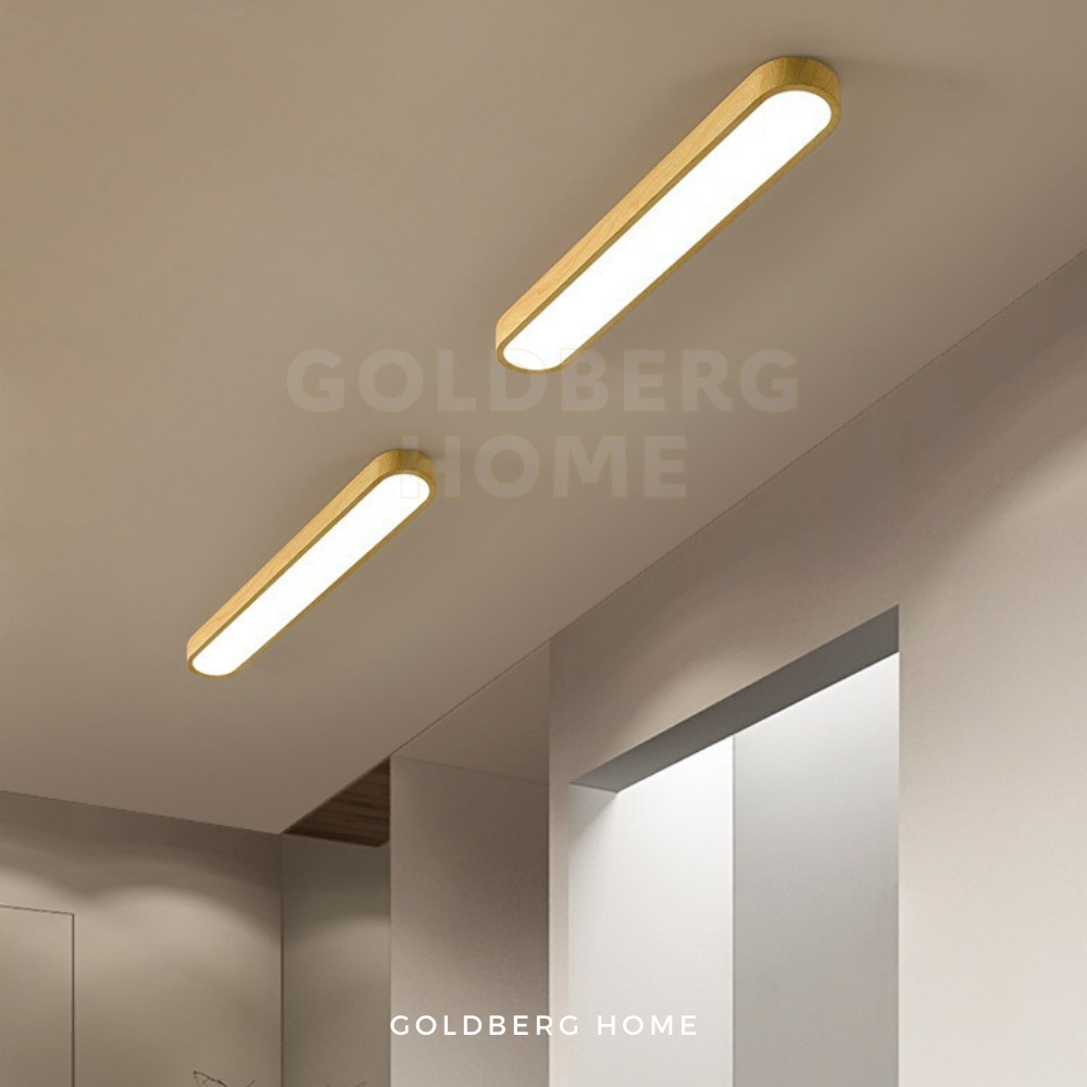 Masako LightWood linear light in a Muji-style Singapore BTO dining room. Goldberg Home minimalist aesthetic.