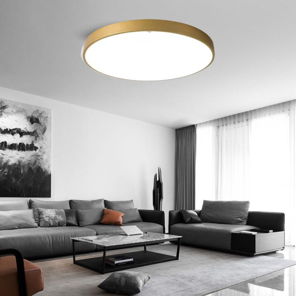 Edinburgh gold ceiling light adding a touch of luxury to a modern Singapore living room.
