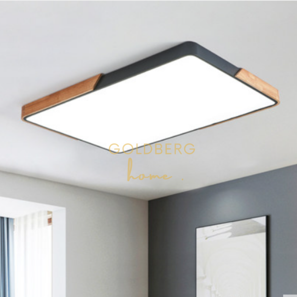 Mariko Nordic rectangle wood light in a spacious Singapore BTO living room. Minimalist Goldberg Home lighting.