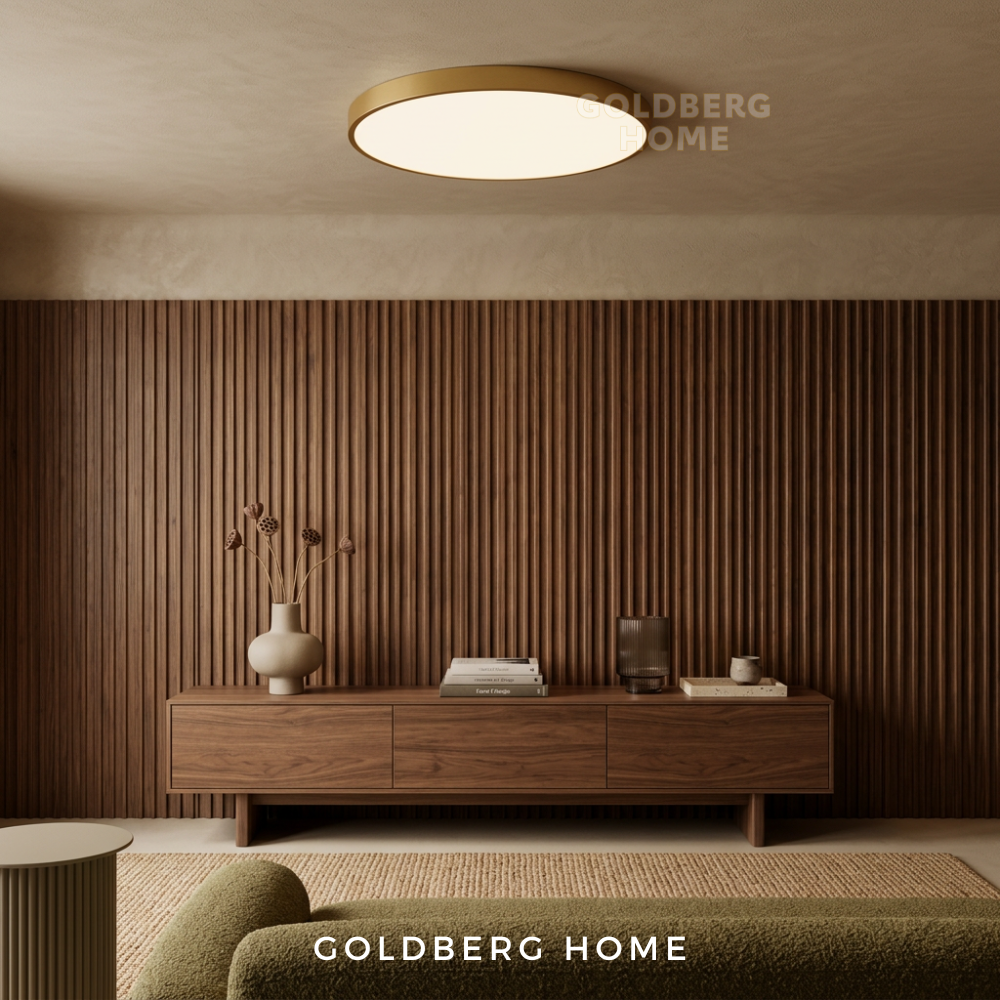 Goldberg Home Edinburgh Premium Gold LED ceiling light installed in modern luxury room with warm glow.