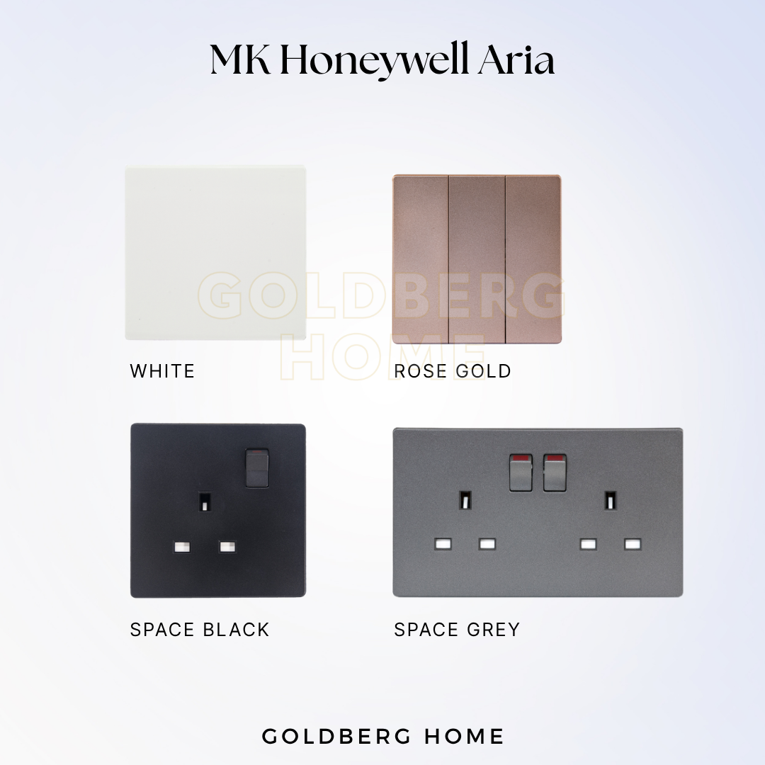 Goldberg Home MK Honeywell Aria switches and sockets shown in White, Rose Gold, Space Grey, and Space Black finishes.