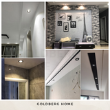 Single square rotatable spotlights highlighting a living room feature wall in a modern Singapore BTO flat.