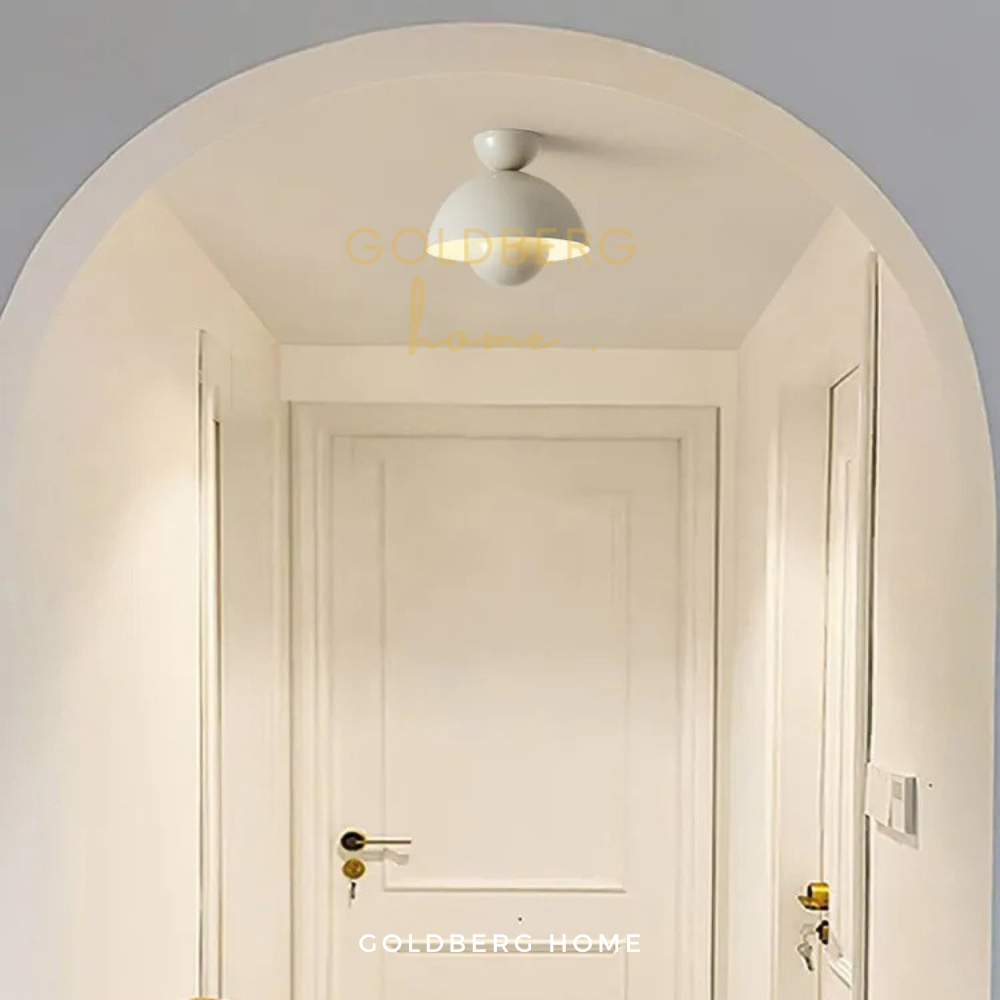 Goldberg Home Spandau spotlights used for bright, even illumination along a home corridor.