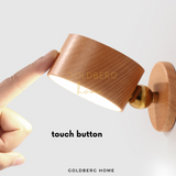 Seamless sensor touch dimming control on the Goldberg Daichi real wood lamp for adjustable brightness levels.
