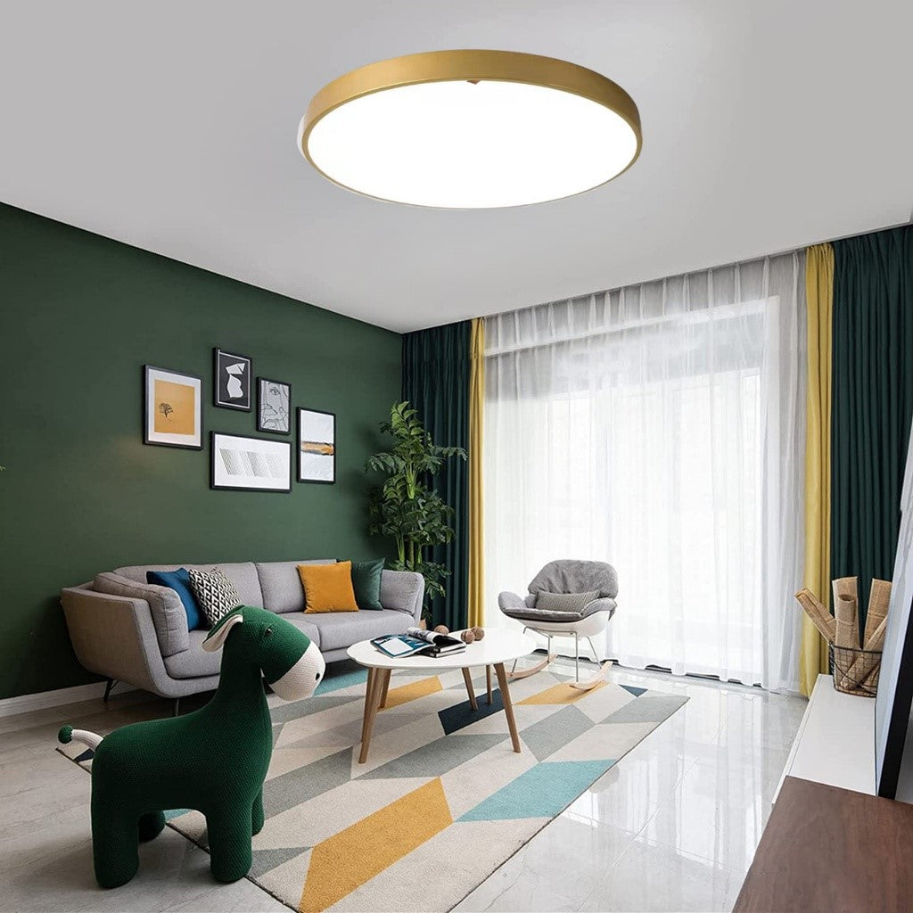 Elegant gold Edinburgh LED light installed in a luxe-themed living room area in a condo.