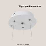 Close-up of the reinforced ceiling base and adjustable cable for Goldberg Louiza series pendant lighting.