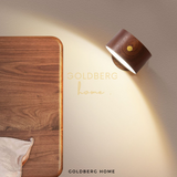 Goldberg Daichi real wood lamp used as a minimalist bedside reading light in a modern Singapore condo.