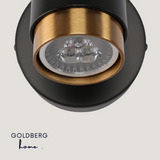 Close-up of GU10 bulb fitting on Goldberg Nacht Luxe wall lamp base.